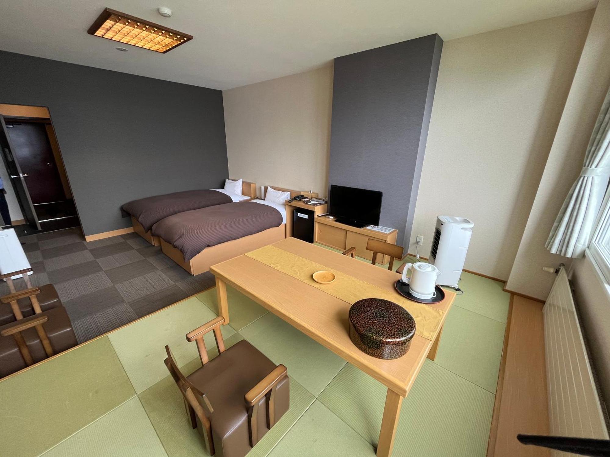 Marukoma Onsen Ryokan Тітосе Екстер'єр фото