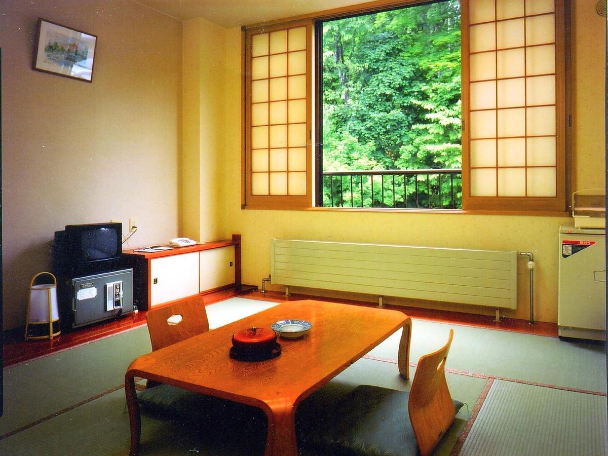 Marukoma Onsen Ryokan Тітосе Екстер'єр фото